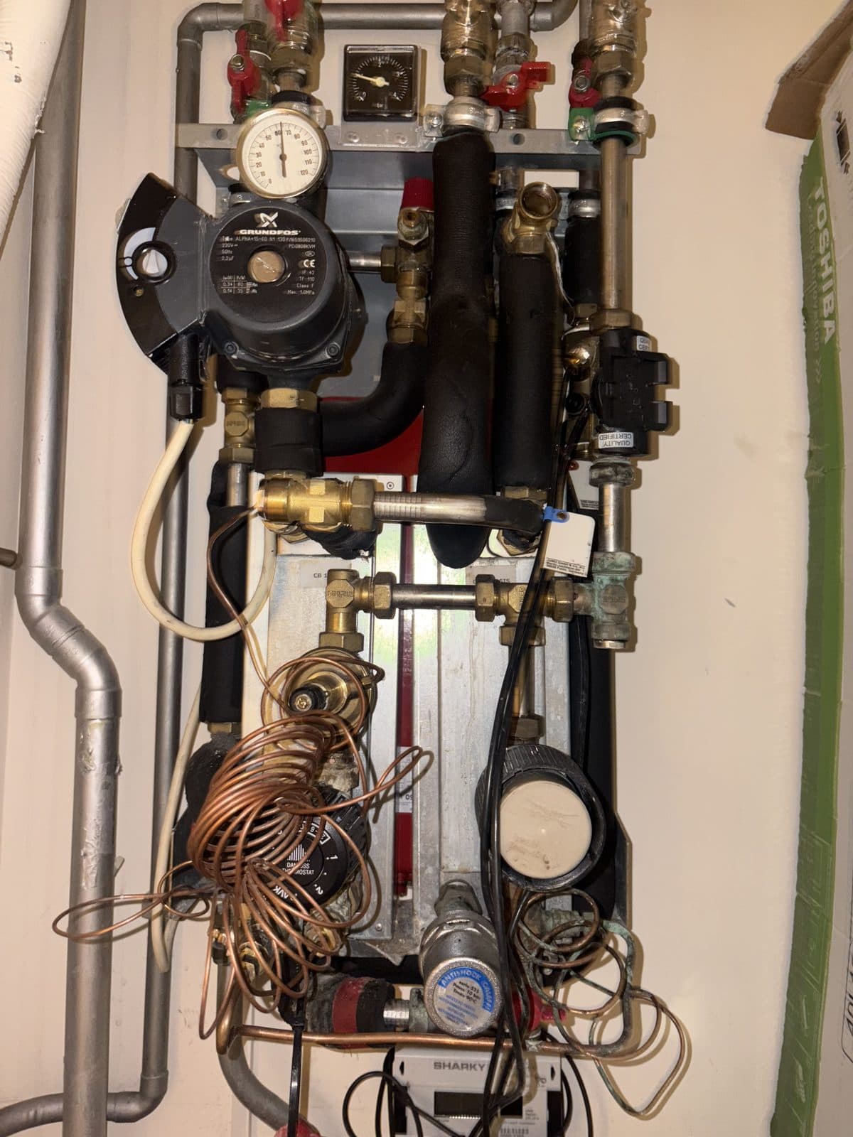 The HIU we were called out to — no hot water reaching the flat.