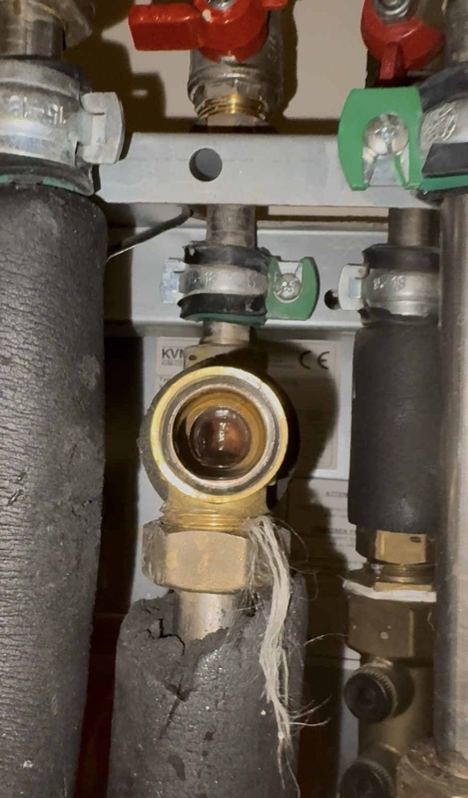 Reassembled and flowing freely — hot water restored, no parts replaced.